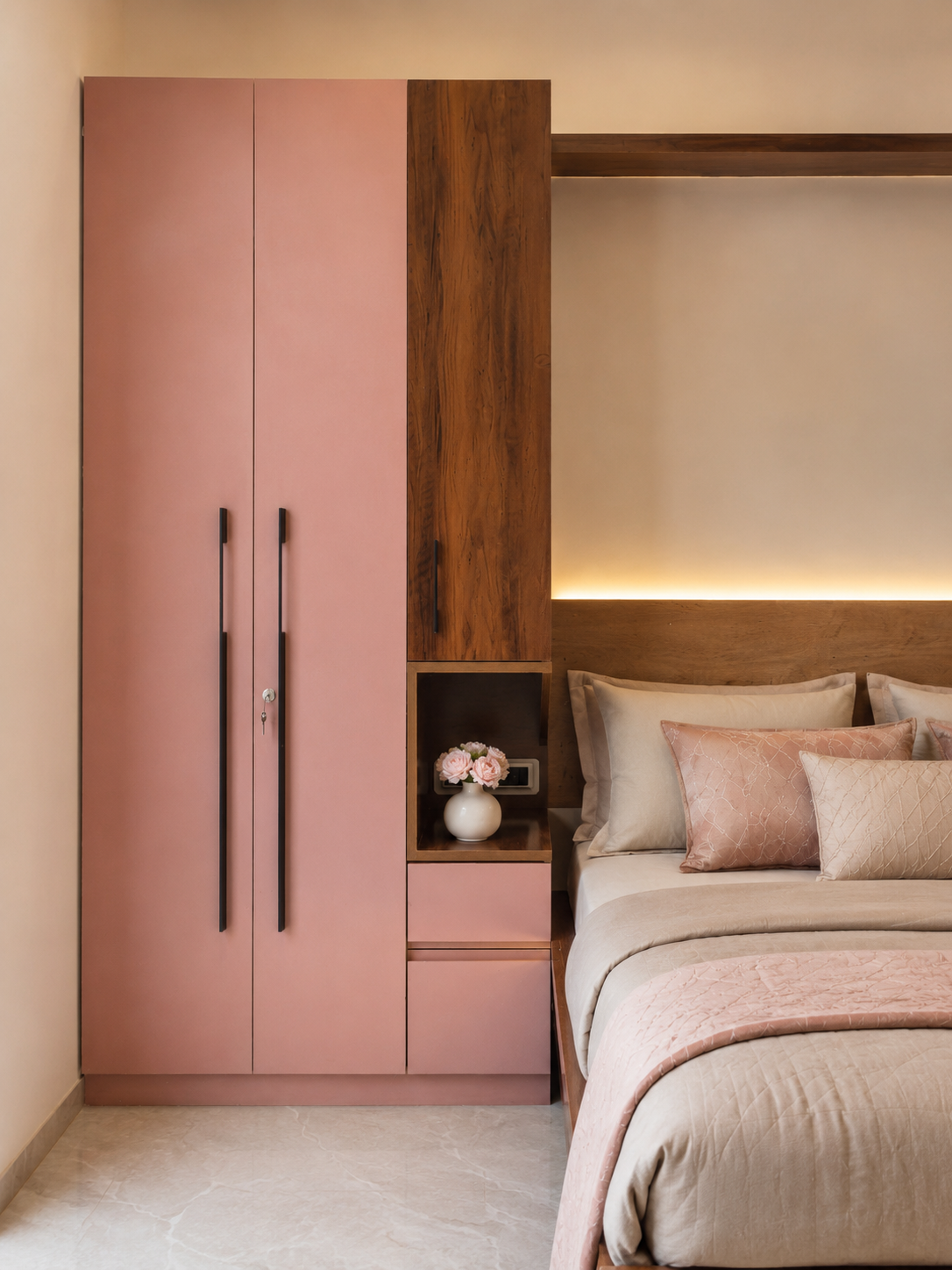 Blush wardrobe with a timber bedside niche and cove lighting in the guest bedroom